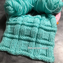 Load image into Gallery viewer, Loom Knit Stitches Button in a Square . Done on a large gauge round knitting loom using Red Heart yarn in Mint.