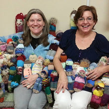 Load image into Gallery viewer, 24 Peg Loom Knit Comfort Doll Pattern Copyright Loomahat Charity Project