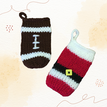 Load image into Gallery viewer, Loom Knit Santa and Football Gift Card Holder. Made on a 24 peg roung loom with Red Heart scrap yarn. Copyright Loomahat