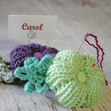 Load image into Gallery viewer, Loom Knit Rib Stitch Puffy Flower Pattern. Made with a 24 peg loom and worsted weight yarn. Copyright Loomahat