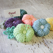 Load image into Gallery viewer, Loom Knit Rib Stitch Puffy Flower Pattern. Made with a 24 peg loom and worsted weight yarn. Copyright Loomahat