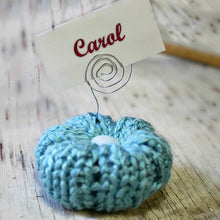 Load image into Gallery viewer, Loom Knit Rib Stitch Puffy Flower Pattern. Made with a 24 peg loom and worsted weight yarn. Copyright Loomahat