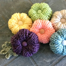 Load image into Gallery viewer, Loom Knit Rib Stitch Puffy Flower Pattern. Made with a 24 peg loom and worsted weight yarn. Copyright Loomahat