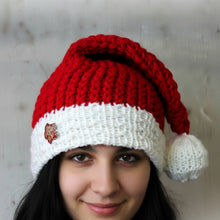 Load image into Gallery viewer, Loom Knit Santa Hat pattern Copyright Loomahat