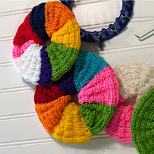 Load image into Gallery viewer, Loom Knit Jumbo Hair Scrunchy Scrunchies Pattern made with 24 peg loom and Red Heart yarn. Copyright Loomahat