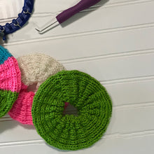 Load image into Gallery viewer, Loom Knit Jumbo Hair Scrunchy Scrunchies Pattern made with 24 peg loom and Red Heart yarn. Copyright Loomahat