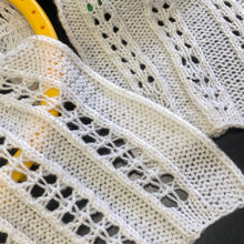 Load image into Gallery viewer, Loom Knit Wheat Lace Double Eyelet Stitch Pattern Copyright Loomahat