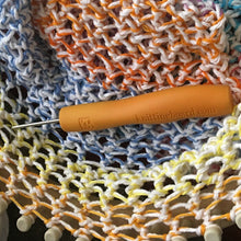 Load image into Gallery viewer, Loom Knit Triangle Scarf Project Pattern made with a 41 peg round loom with cotton yarn and embroidery floss.. Can be done wih any shape loom. Has video tutorial. Copyright Loomahat