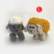 Load image into Gallery viewer, Loom Knit Tiny Sheep Toys Doll Pattern  made on a 24 peg round loom. Using Red Heat worsted weight yarn. Copyright Loomahat
