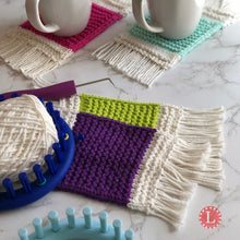 Load image into Gallery viewer, Loom Knit Mug Rug Coaster made with a round 24 peg loom and Peaches and Cream cotton yarn. Copyright Loomahat
