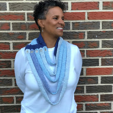 Load image into Gallery viewer, Loom knit scarf cowl pattern. Made on a 24 peg round knitting loom with Red Heart worsted weight yarn. Copyright Loomahat