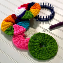 Load image into Gallery viewer, Loom Knit Jumbo Hair Scrunchy Scrunchies Pattern made with 24 peg loom and Red Heart yarn. Copyright Loomahat
