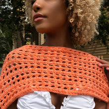 Load image into Gallery viewer, Loom Knit Little Arrowhead Stitch Shawl Pattern made with a 41 peg loom and orange worsted weight yarn. Copyright Loomahat
