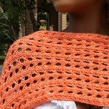 Load image into Gallery viewer, Loom Knit Little Arrowhead Stitch Shawl Pattern made with a 41 peg loom and orange worsted weight yarn. Copyright Loomahat

