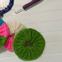 Load image into Gallery viewer, Loom Knit Jumbo Hair Scrunchy Scrunchies Pattern made with 24 peg loom and Red Heart yarn. Copyright Loomahat
