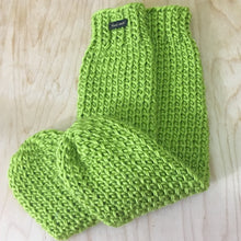 Load image into Gallery viewer, Loom Knit Tube Socks Pattern made with 24 peg loom with green worsted weight yarn. Copyright Loomahat
